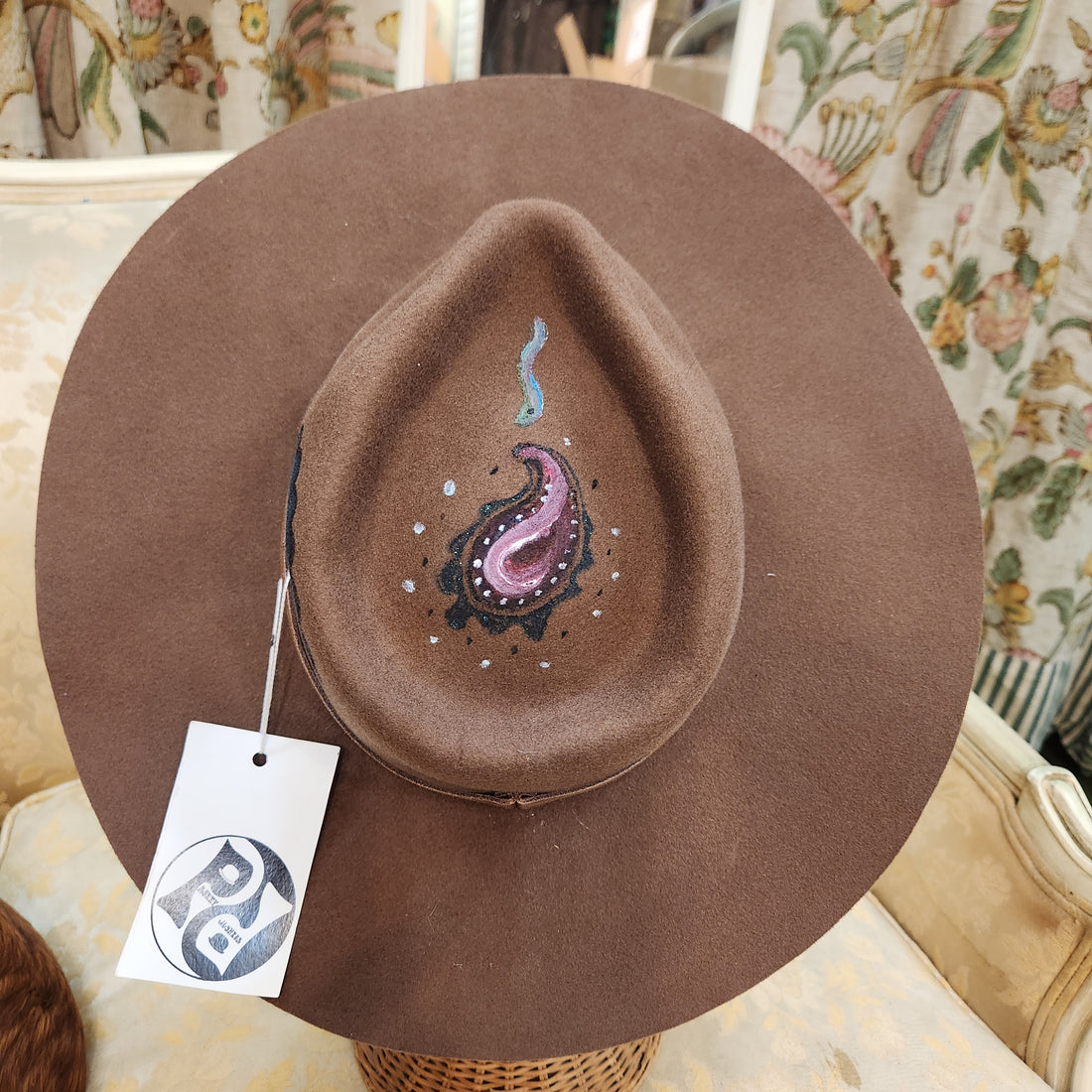 A brown Mens Bowler hat fashion been displayed